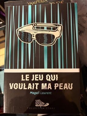 Le Jeu Qui Voulait Ma Peau by Magali Laurent - Black & Teal Cover